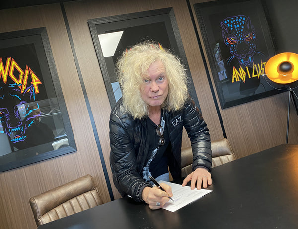 Def Leppard Band Member Signs Contract